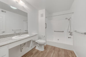 large bathroom with full tub and shower